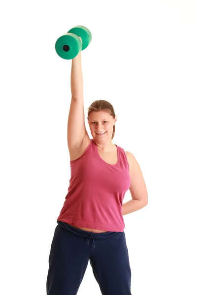 Mujer joven haciendo ejercicio con pesas — Foto de Stock