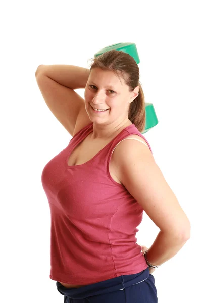 Ung kvinna tränar med vikter — Stockfoto