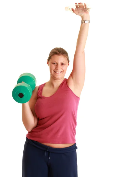 Giovane donna che esercita con pesi — Foto Stock