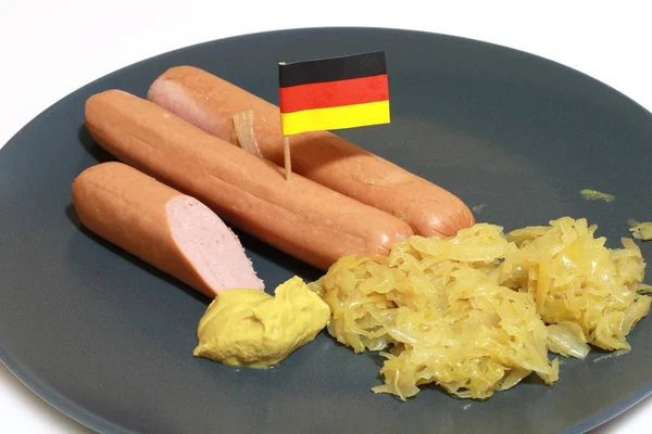 Kolbász- és sauerkrauts — Stock Fotó