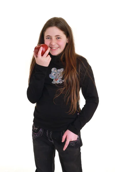 Підліток з червоним яблуком — стокове фото