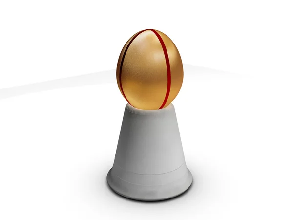 Huevo dorado en soporte — Foto de Stock