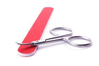 Scissors and file over white clipart