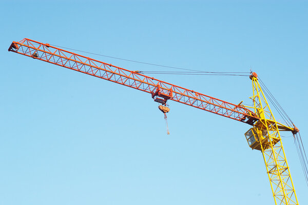 Lifting crane in blue sky