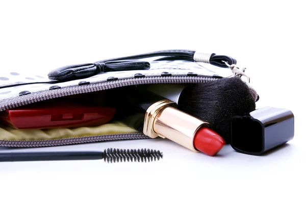 stock image Purse with cosmetics on white