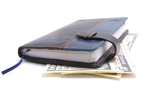 Caderno e dólares em branco — Fotografia de Stock