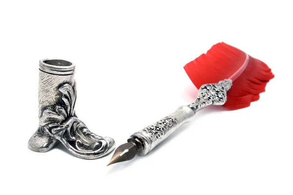 Old pen with red feather and holder — Stock Photo, Image