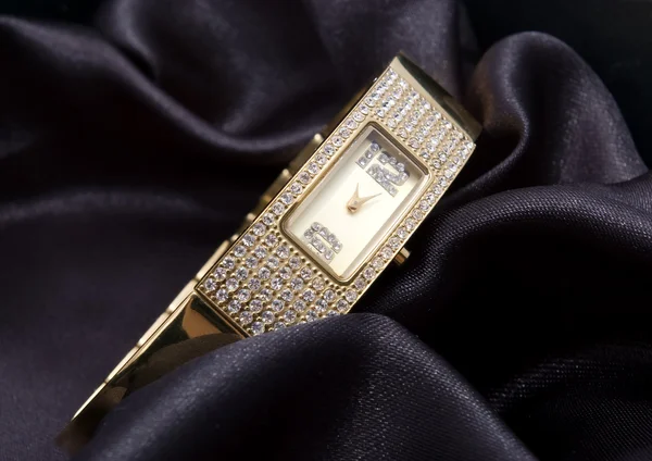Χρυσή γυναίκα ρολόι Εικόνα Αρχείου