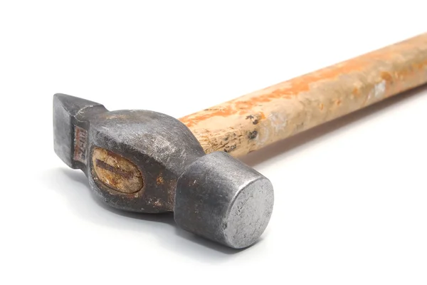 Old hammer on white Stockfoto