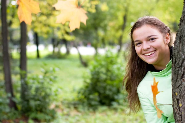 stock image Smiling girl in autumn