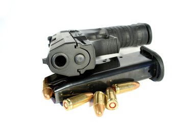 Real gun and clip with ammo 9 mm clipart