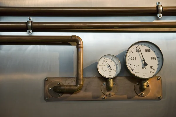Two metres with pipes — Stock Photo, Image
