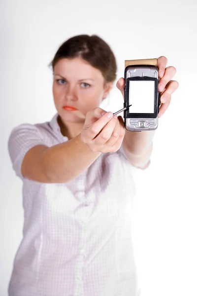 Pretty girl with a smartphone — Stock Photo, Image