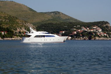 A medium yacht on the coast of Adriatic Sea clipart