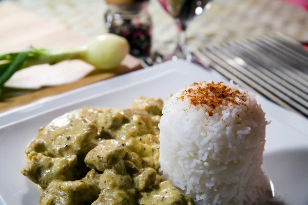 stock image Chicken with rice in curry spice