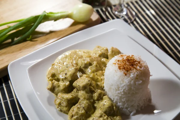 stock image Chicken and rice in curry spice