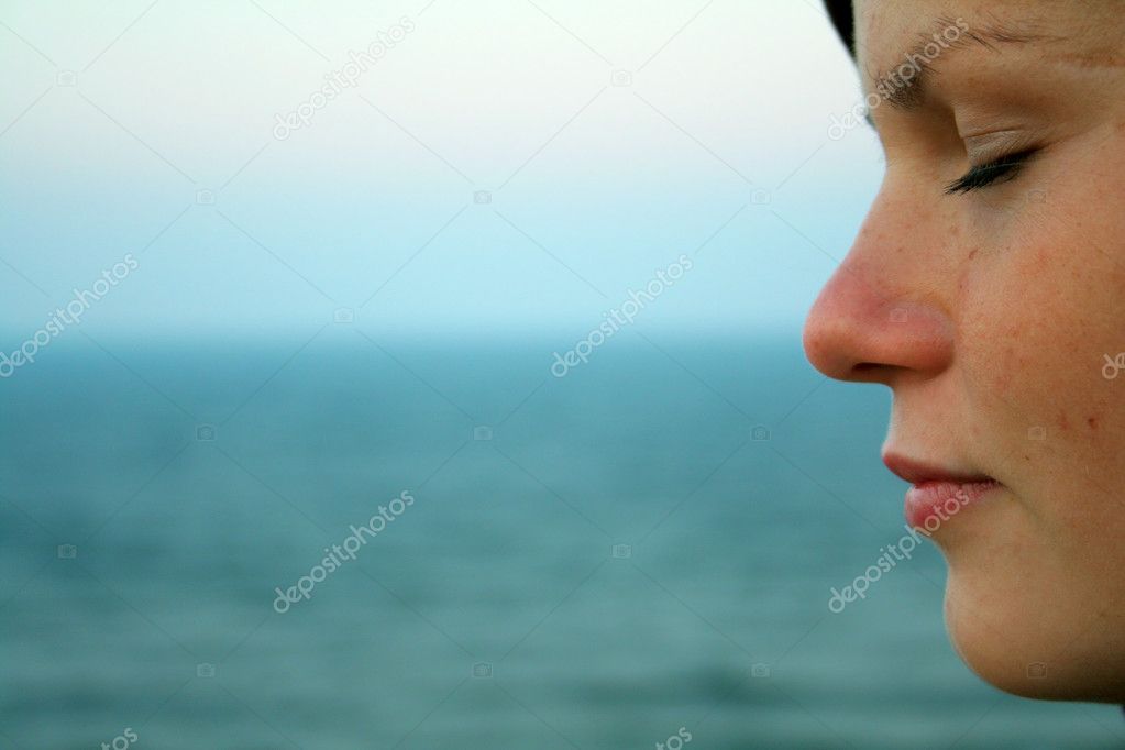 Thinking wooman at the seashore