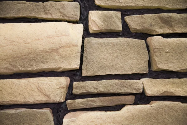 Fragment of sandstone wall — Stock Photo, Image