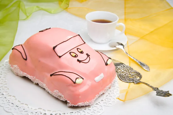 Car cake with a cup of coffee — Stock Photo, Image