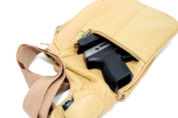 Bolsa e pistola — Fotografia de Stock