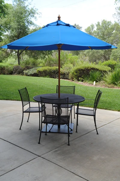 stock image Wrought Iron Table With Umbrella