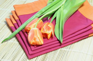 Tulips on placemats clipart