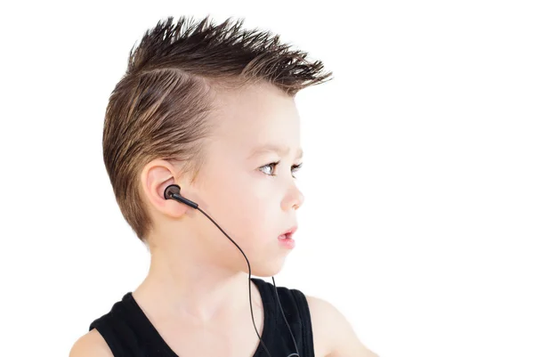 Junge mit Kopfhörern Stockbild