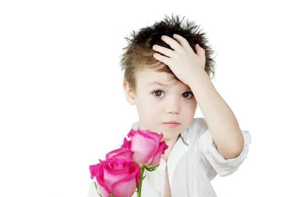 Chłopiec i róże — Zdjęcie stockowe