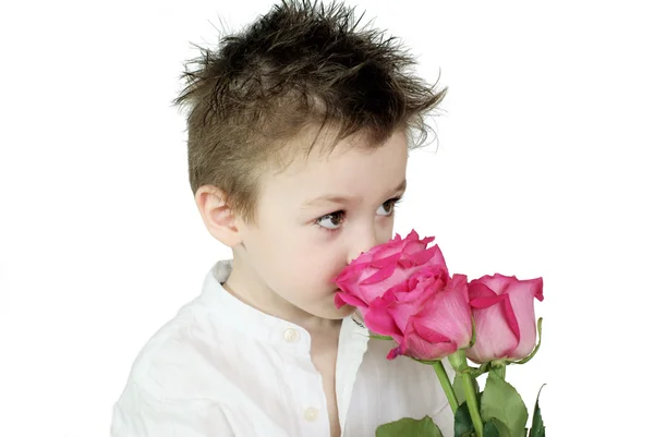 Jongen en rozen — Stockfoto