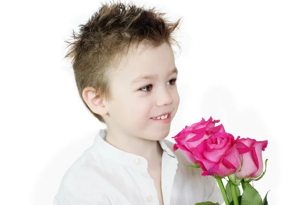 Fiú és rózsák — Stock Fotó