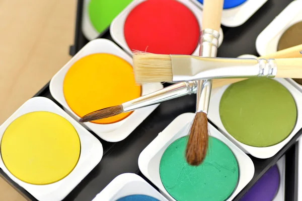 Water paints set and brushes — Stock Photo, Image