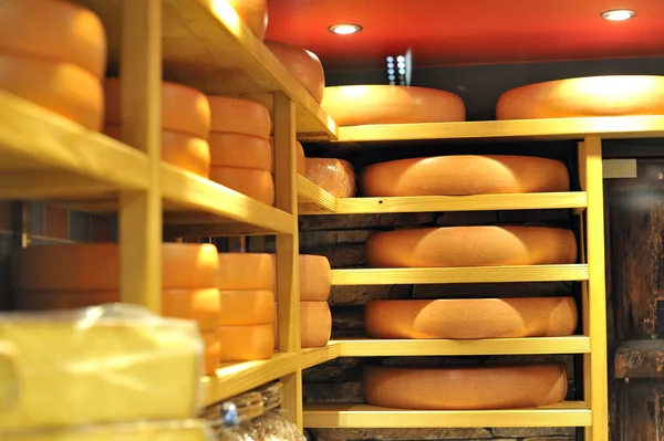 Round stacks of cheese stored