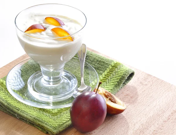 stock image Yogurt and plums fruit