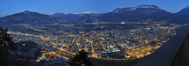 Overview of Trento in night time clipart