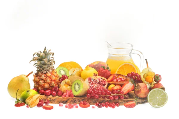 Frutas frescas e sumo de laranja — Fotografia de Stock