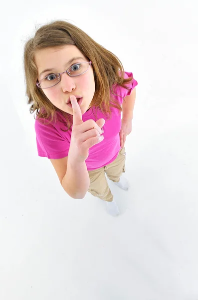 Gesto menina para seus lábios para indicar sil — Fotografia de Stock