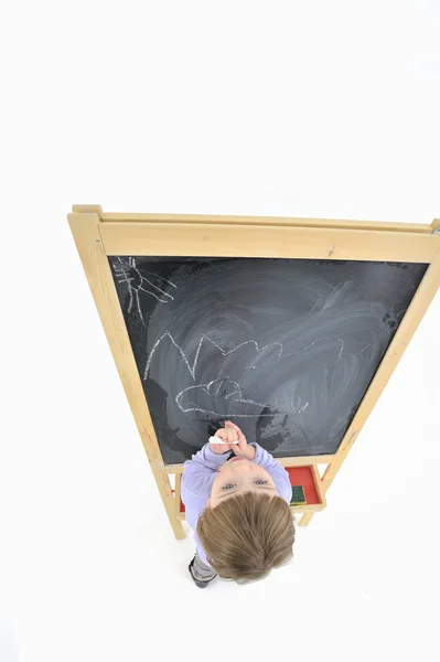 Küçük kız ve yazı tahtası — Stok fotoğraf