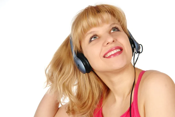 Jonge vrouw luisteren een muziek — Stockfoto