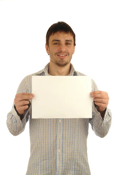 Giovane uomo in possesso di cartone bianco bianco — Foto Stock