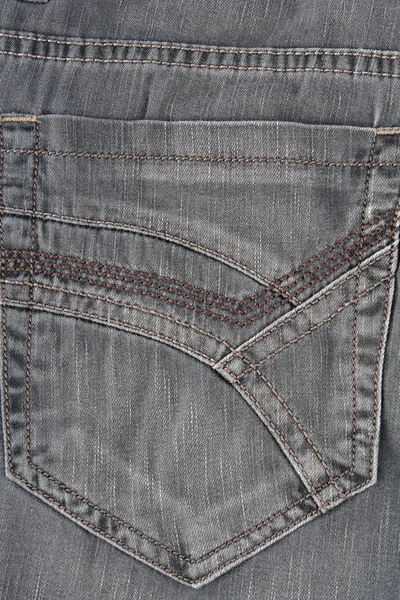 Текстура сірих джинсів крупним планом — стокове фото