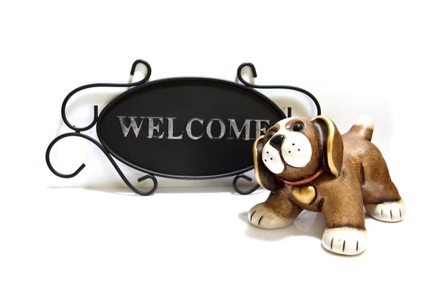 stock image Puppy and Welcome shild