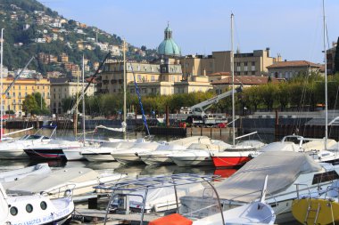 Italy, Como: the commercial harbour clipart