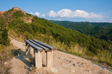 Bench on a Mountain Path clipart