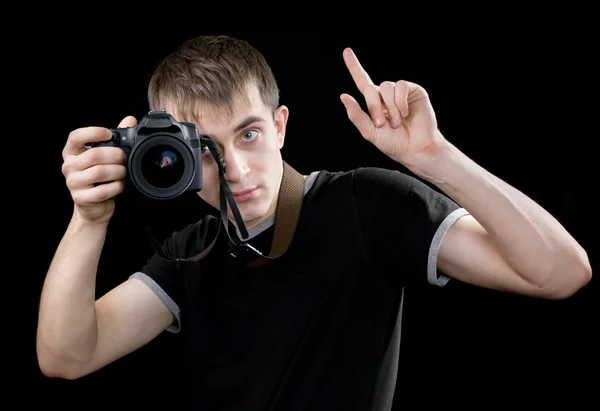 Giovane fotografo al lavoro — Foto Stock