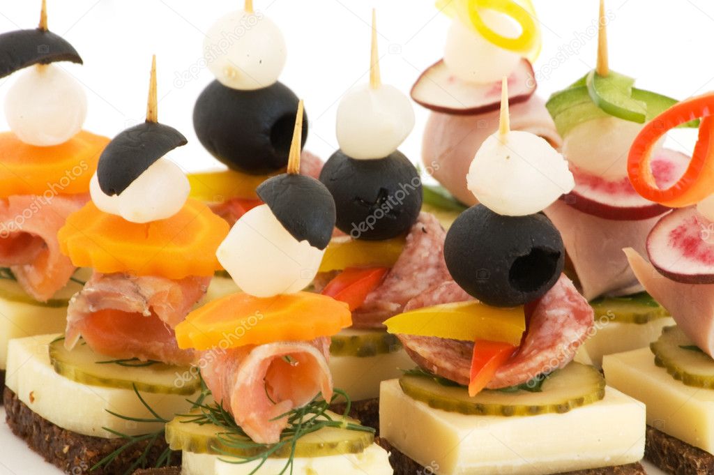 Appetizers served on cocktail sticks — Stock Photo © LizaFoto 2606494