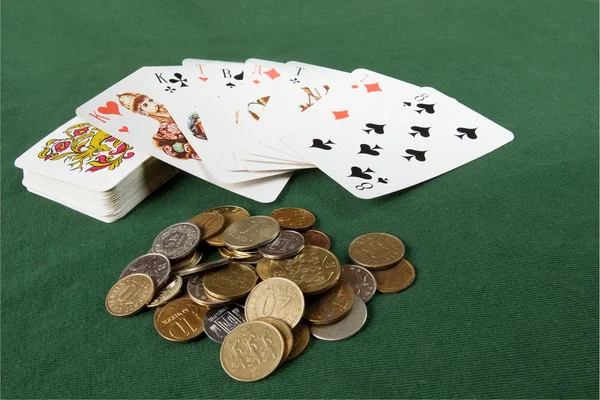 Playing cards and coins — Stock Photo, Image