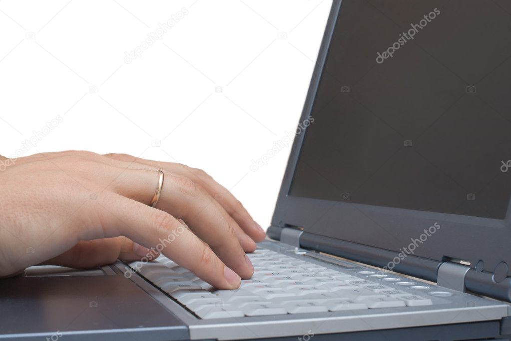 Typing on laptop