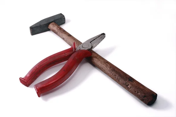 stock image Tongs and hammer.