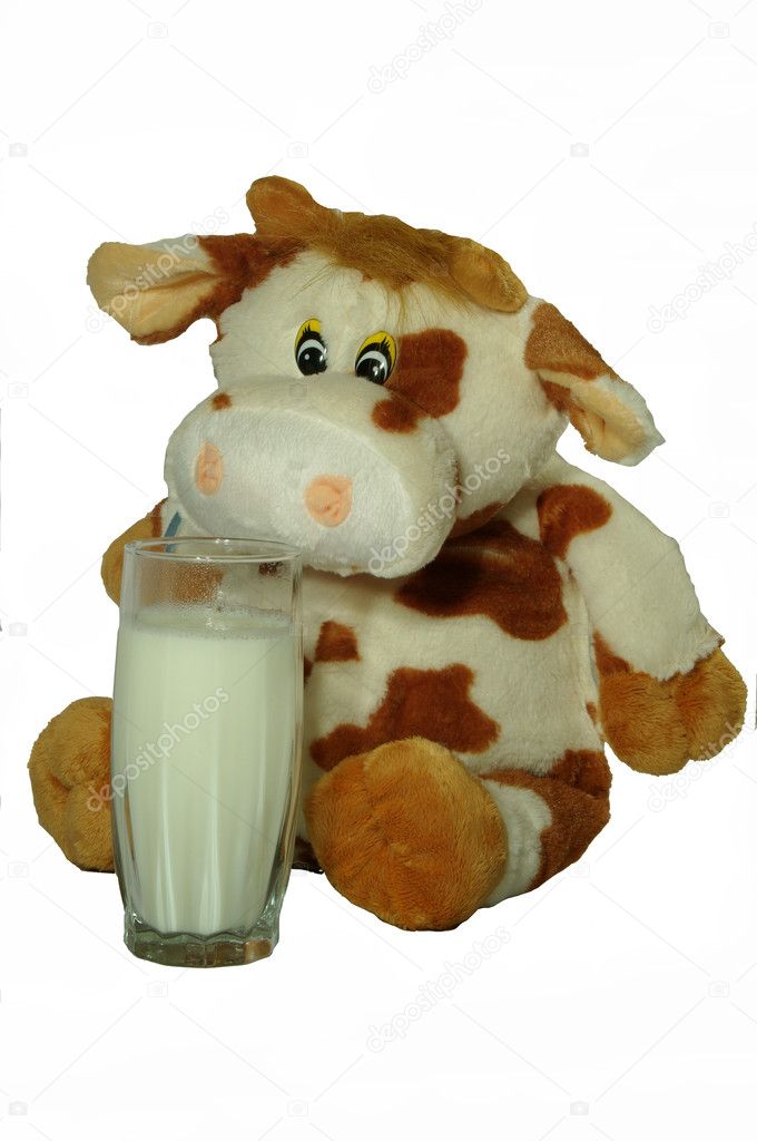 Cow with glass of milk