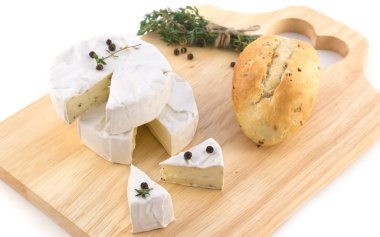 Cheese and a bundle of herbs